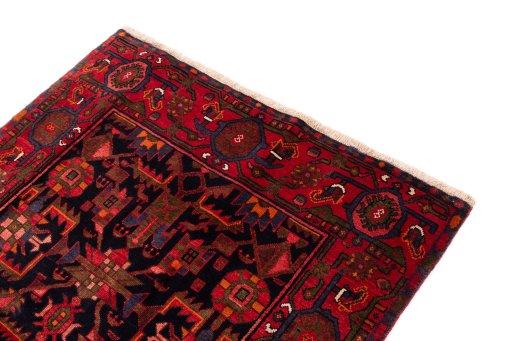 Surface texture of 1975s Hamedan rug with natural Wool and intricate pattern