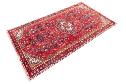 Corner detail of 1982s Hamedan rug showing border pattern and Wool pile
