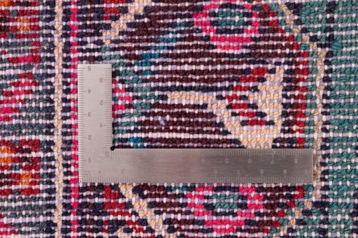 Close-up detail of 1975s Hamedan rug from Iran / Persia showing Wool weave