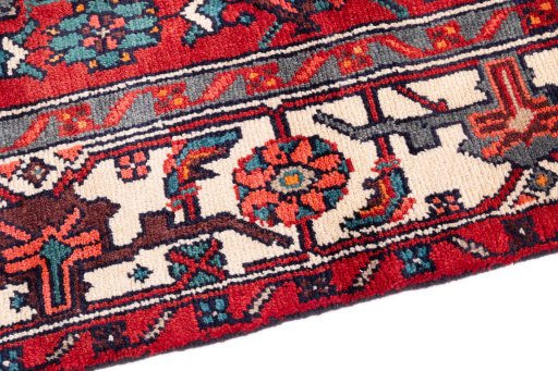 Backside of handmade 1975s Hamedan rug showing knot structure and weave density
