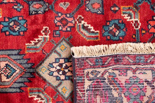 Close-up detail of 1975s Hamedan rug from Iran / Persia showing Wool weave