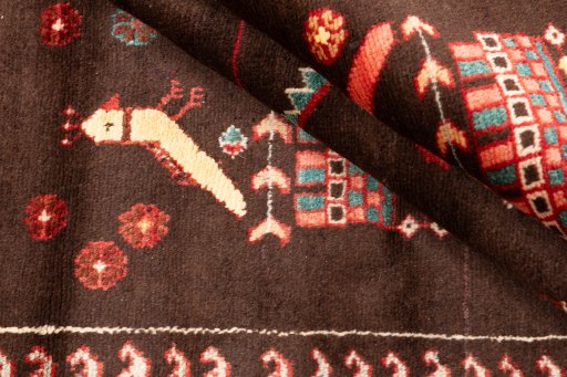 Surface texture of 1975s Hamedan rug with natural Wool and intricate pattern