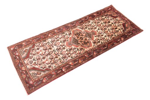 Close-up detail of 2000s Hamedan rug from Iran / Persia showing Wool weave