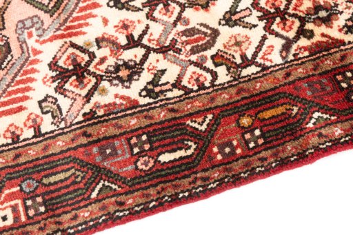 Backside of handmade 2000s Hamedan rug showing knot structure and weave density