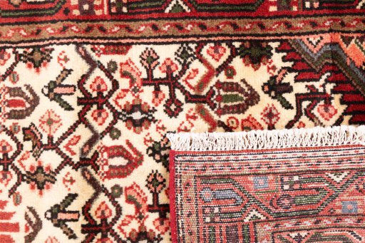 Close-up detail of 2000s Hamedan rug from Iran / Persia showing Wool weave