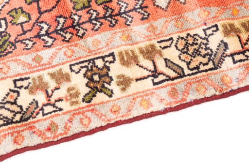 Backside of handmade 1976s Hamedan rug showing knot structure and weave density