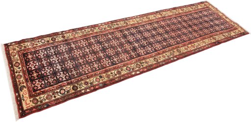 Corner detail of 1990s Hamedan rug showing border pattern and Wool pile