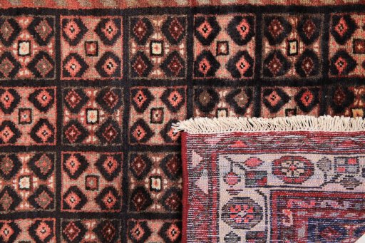 Close-up detail of 1990s Hamedan rug from Iran / Persia showing Wool weave