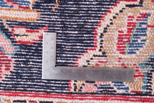 Corner detail of 1984s Hamedan rug showing border pattern and Wool pile