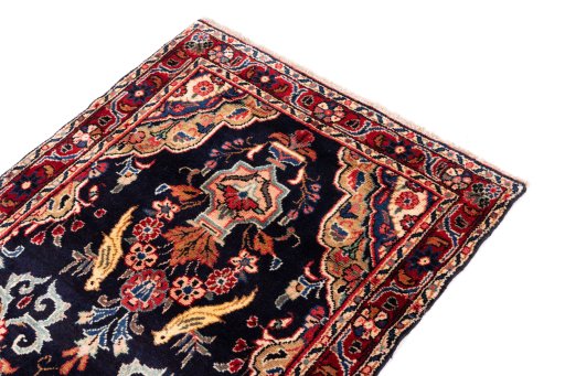 Surface texture of 1984s Hamedan rug with natural Wool and intricate pattern