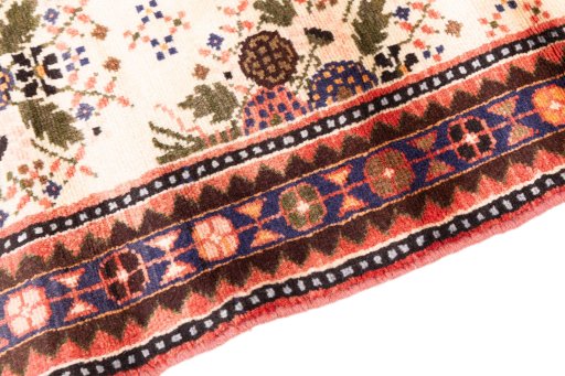 Backside of handmade 2002s Hamedan rug showing knot structure and weave density