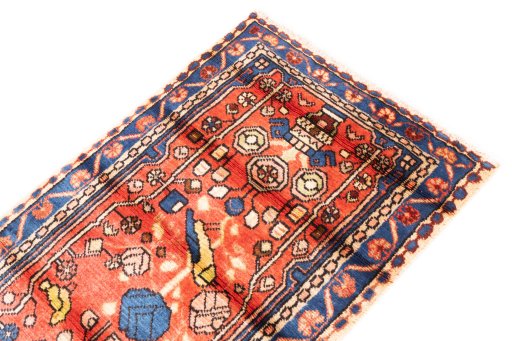 Surface texture of 1975s Hamedan rug with natural Wool and intricate pattern