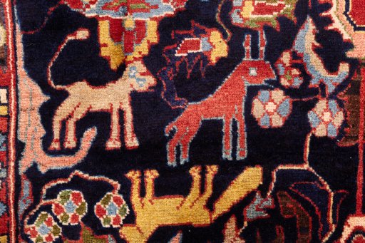 Corner detail of 2000s Hamedan rug showing border pattern and Wool pile