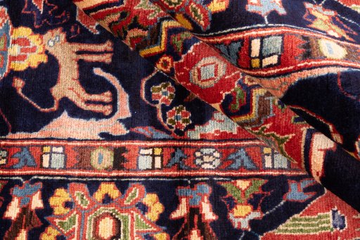 Close-up detail of 2000s Hamedan rug from Iran / Persia showing Wool weave