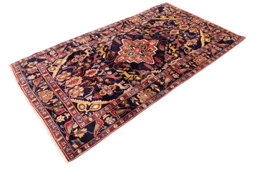Close-up detail of 2000s Hamedan rug from Iran / Persia showing Wool weave