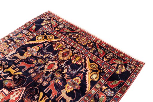 Surface texture of 2000s Hamedan rug with natural Wool and intricate pattern