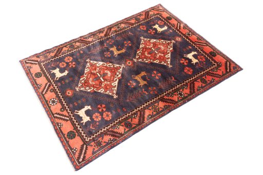 Close-up detail of 1971s Hamedan rug from Iran / Persia showing Wool weave