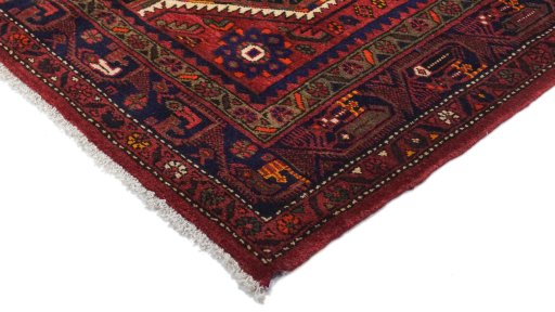 Backside of handmade New Hamedan rug showing knot structure and weave density