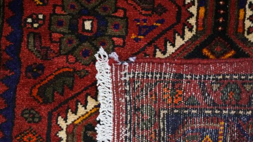 Close-up detail of New Hamedan rug from Iran / Persia showing Wool weave