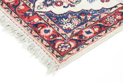 Backside of handmade 1990s Hamedan rug showing knot structure and weave density