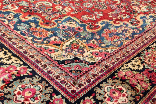 Backside of handmade 2002s Hamedan rug showing knot structure and weave density