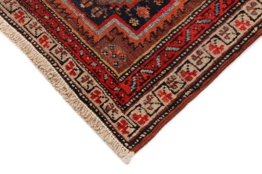 Backside of handmade 1900s Heriz rug showing knot structure and weave density