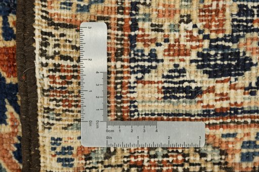 Corner detail of 1920s Heriz rug showing border pattern and Wool pile