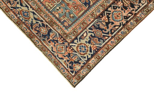 Backside of handmade 1920s Heriz rug showing knot structure and weave density