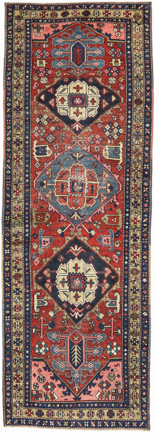 Full view of 1920s Heriz rug from Iran / Persia, 320 × 110 cm in Red tones