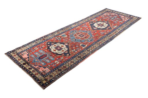 Close-up detail of 1920s Heriz rug from Iran / Persia showing Wool weave
