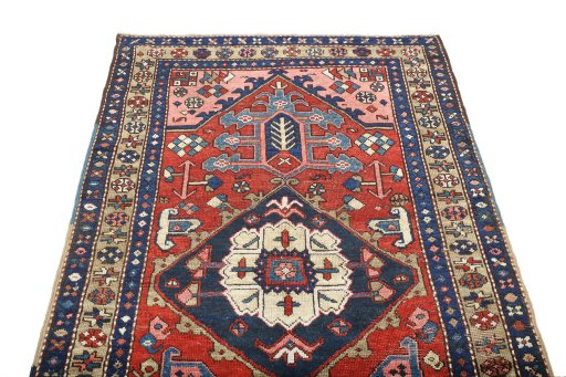 Surface texture of 1920s Heriz rug with natural Wool and intricate pattern