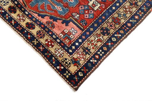 Backside of handmade 1920s Heriz rug showing knot structure and weave density