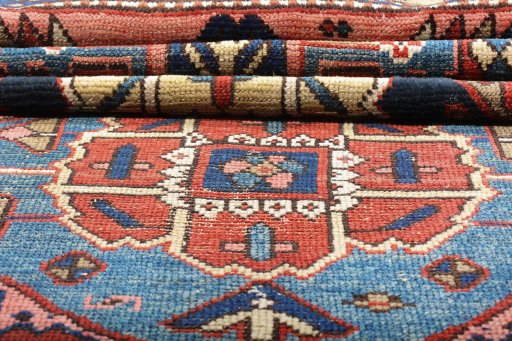 Full view of 1920s Heriz rug from Iran / Persia, 320 × 110 cm in Red tones