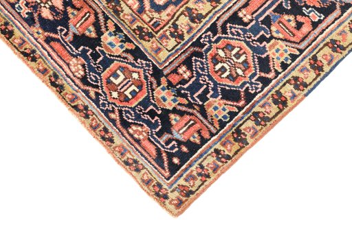 Backside of handmade 1920s Heriz rug showing knot structure and weave density