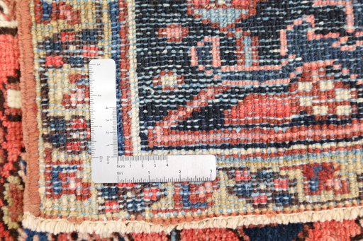 Close-up detail of 1920s Heriz rug from Iran / Persia showing Wool weave