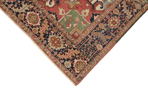 Backside of handmade 1900s Heriz rug showing knot structure and weave density