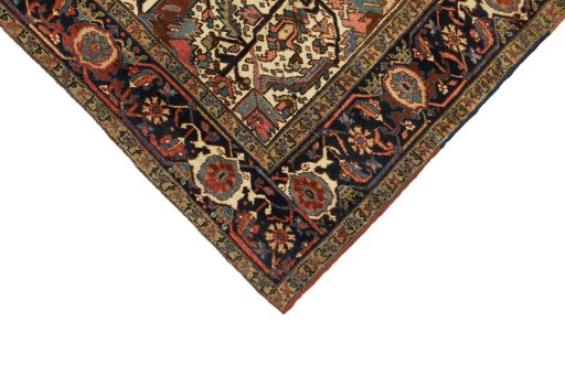 Backside of handmade 1920s Heriz rug showing knot structure and weave density