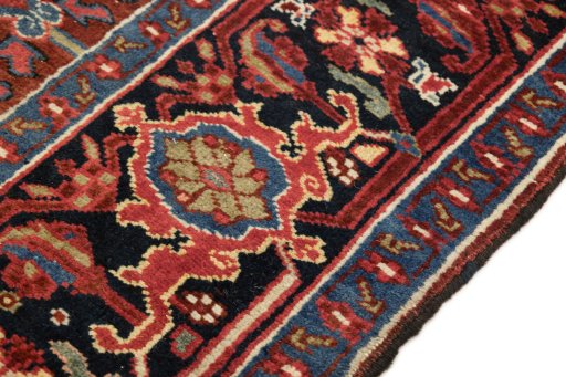 Close-up detail of 1940s Heriz rug from Iran / Persia showing Wool weave