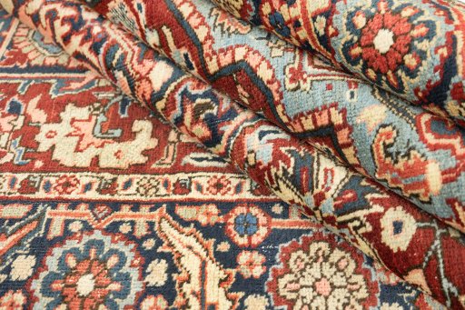 Full view of 1920s Heriz rug from Iran / Persia, 275 × 188 cm in Dark red tones