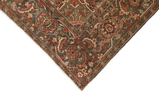 Backside of handmade 1930s Heriz rug showing knot structure and weave density
