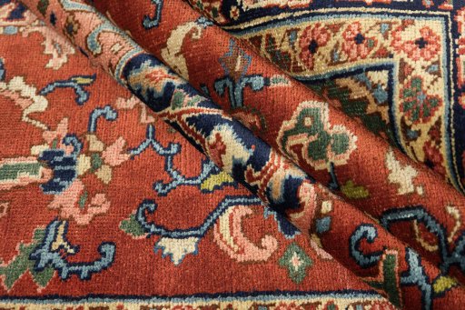 Corner detail of 1920s Heriz rug showing border pattern and Wool pile