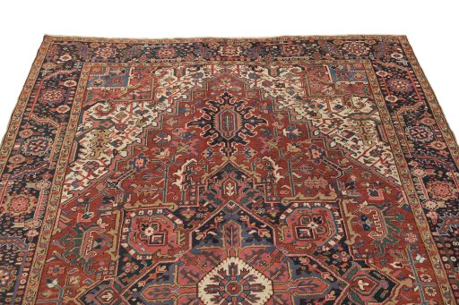 Surface texture of 1930s Heriz rug with natural Wool and intricate pattern