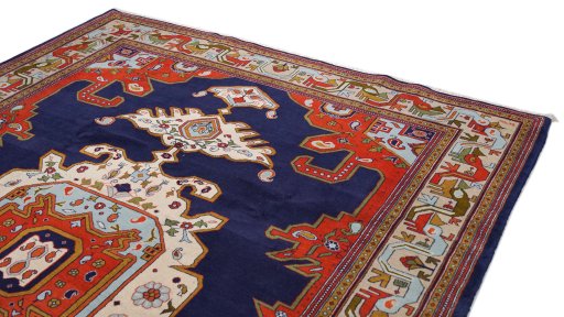 Surface texture of 1990s Heriz rug with natural Wool and intricate pattern