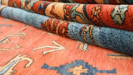 Close-up detail of 1990s Heriz rug from Afghanistan showing Wool weave