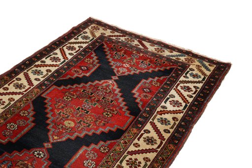 Close-up detail of 1880s Heriz rug from Iran / Persia showing Wool weave
