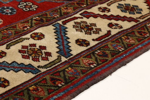 Backside of handmade 1880s Heriz rug showing knot structure and weave density