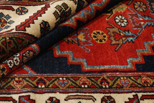 Close-up detail of 1880s Heriz rug from Iran / Persia showing Wool weave