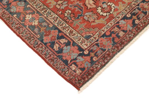 Backside of handmade 1900s Heriz rug showing knot structure and weave density