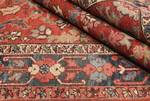 Close-up detail of 1900s Heriz rug from Iran / Persia showing Wool weave