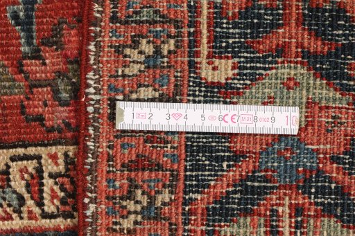 Full view of 1900s Heriz rug from Iran / Persia, 147 × 107 cm in Red tones